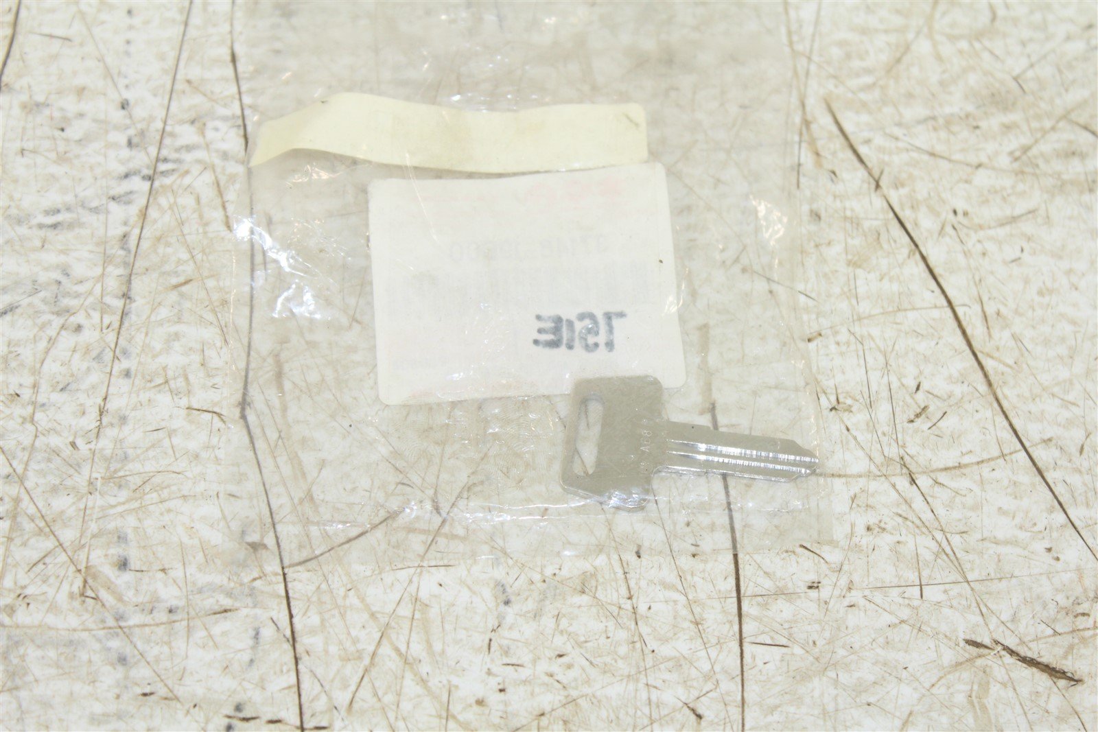 NOS Suzuki BLANK KEY 37146-19B00 OEM NEW