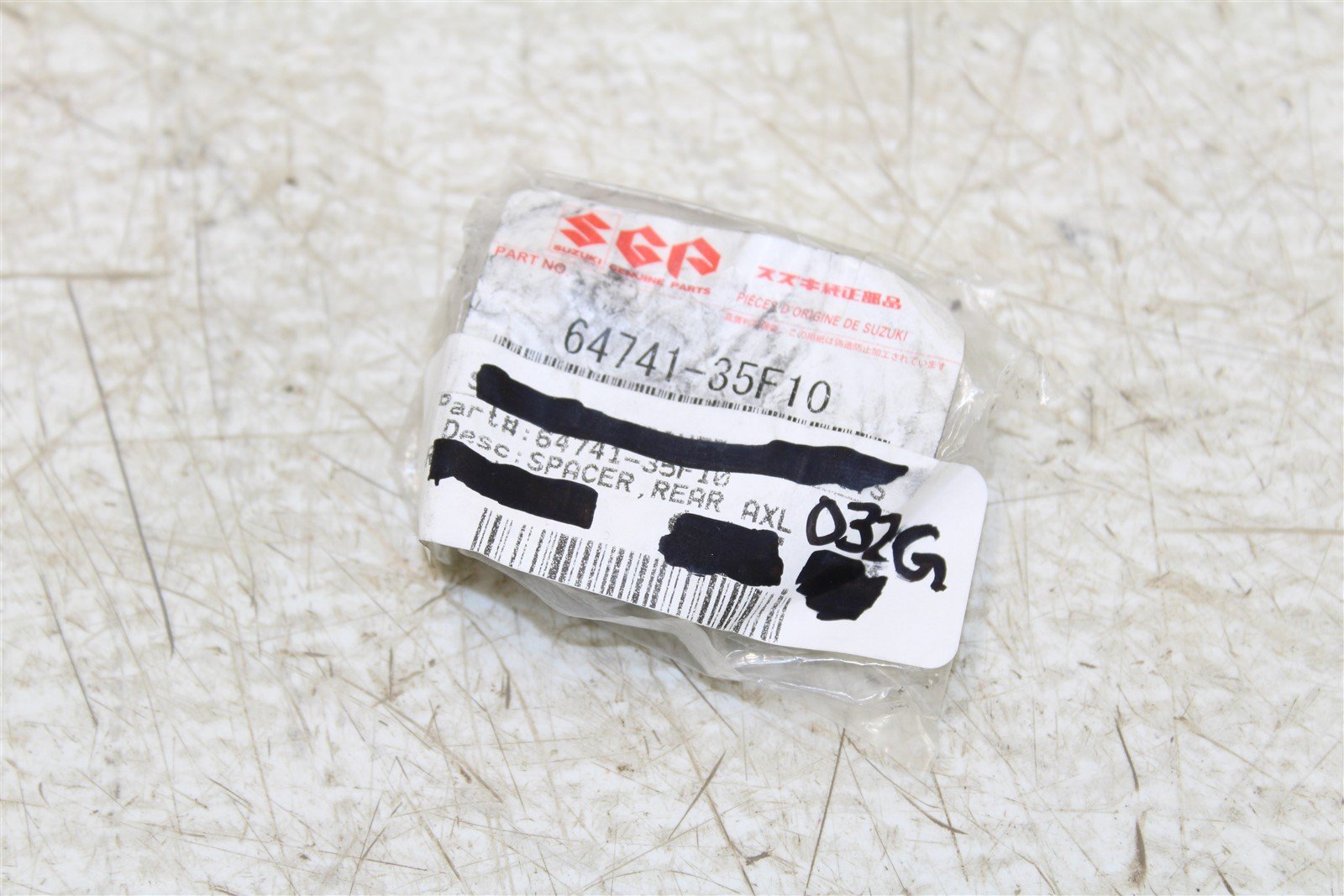 NOS Suzuki Right Rear Axle Wheel Spacer OEM 64741-35F10