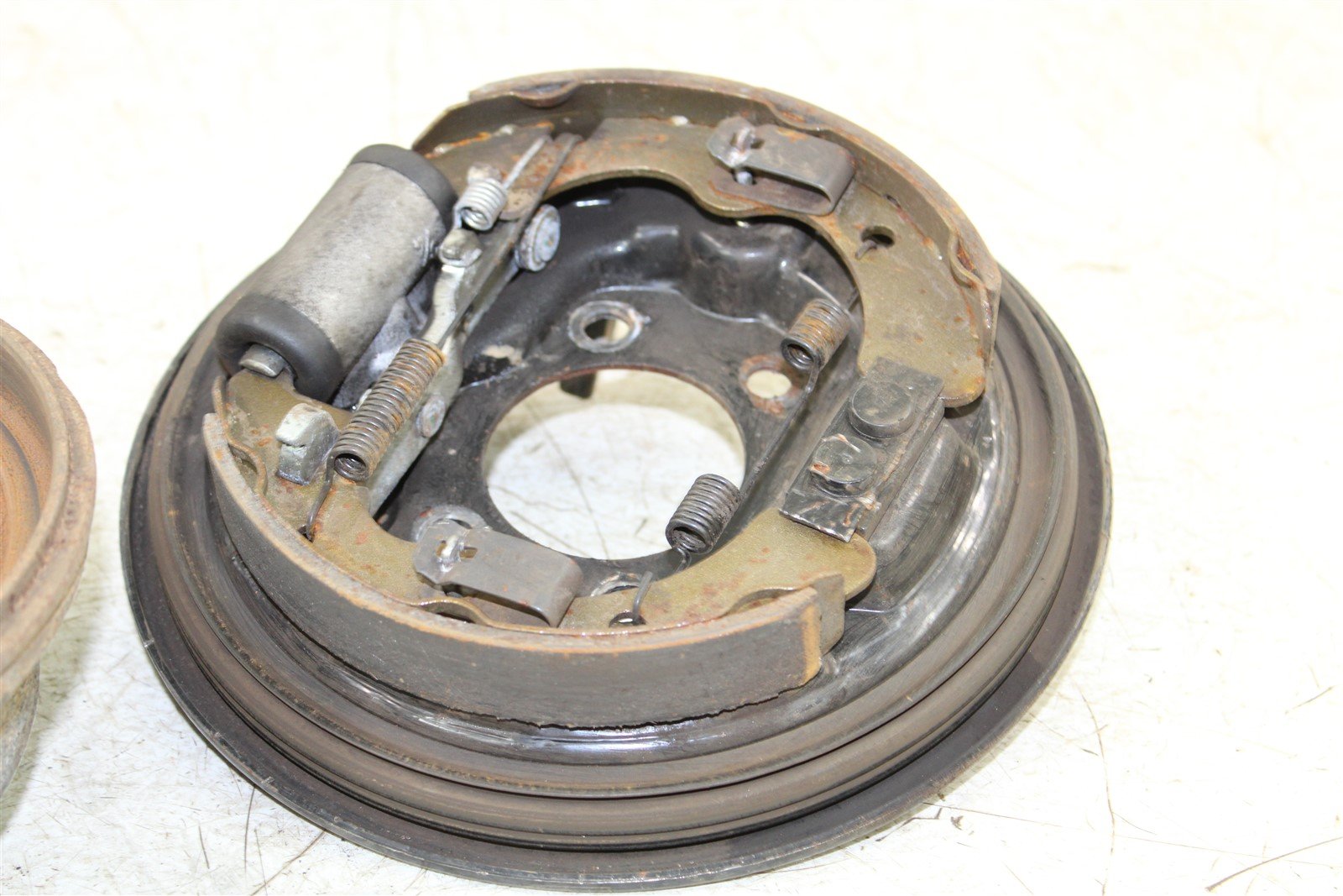 2002 Kawasaki Mule 3010 4x4 Rear Left Brake Drum Backing Plate Panel Hub