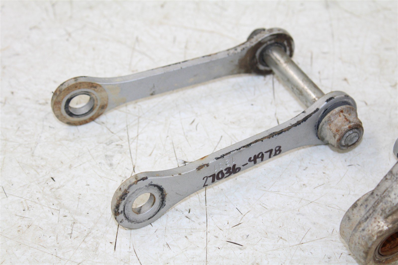 2003 Kawasaki KX 85 Linkage Suspension Link Rear Relay Arm 27036