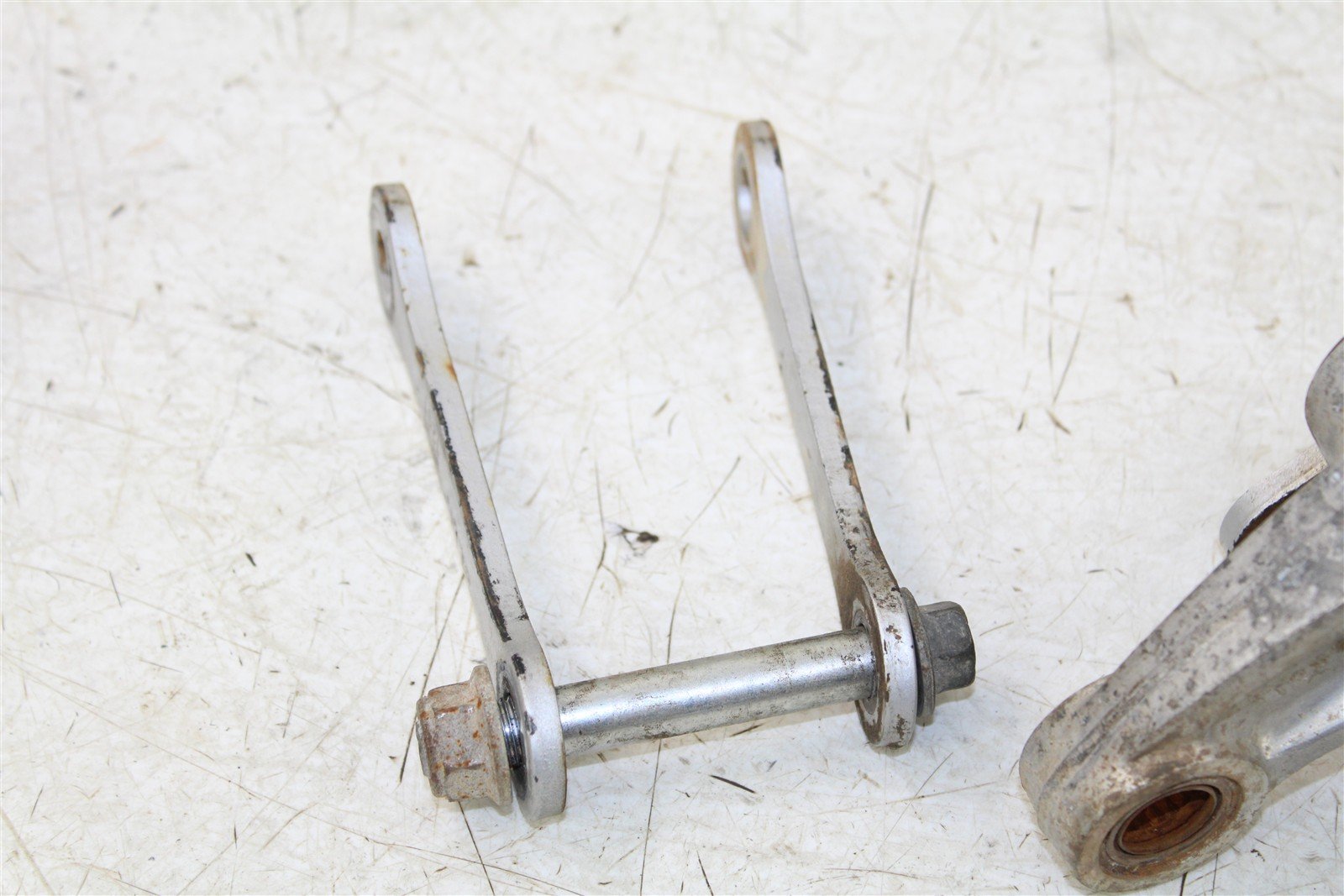 2003 Kawasaki KX 85 Linkage Suspension Link Rear Relay Arm 27036