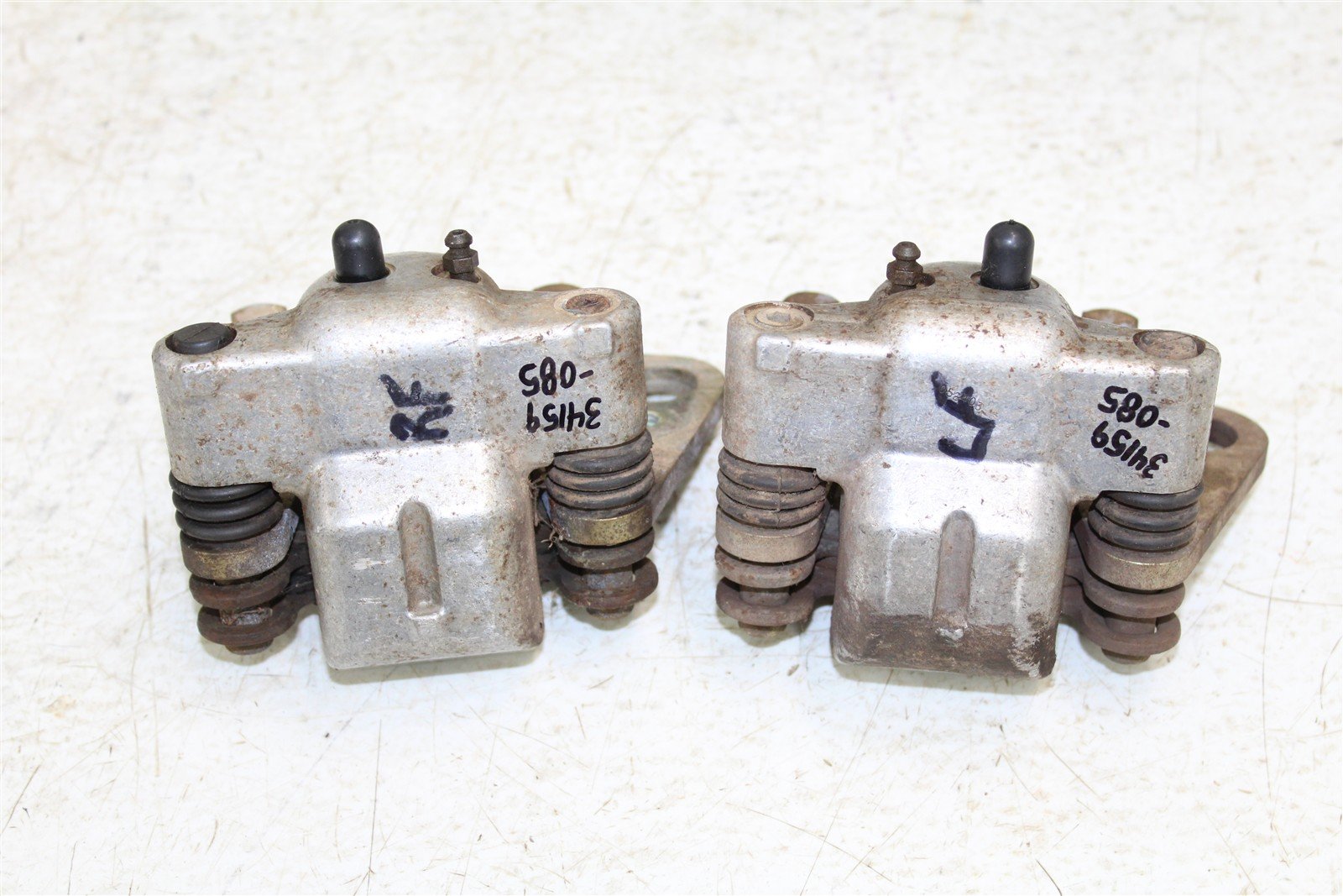 2004 Polaris ATP 330 4x4 Front Brake Calipers Set Left Right 34159