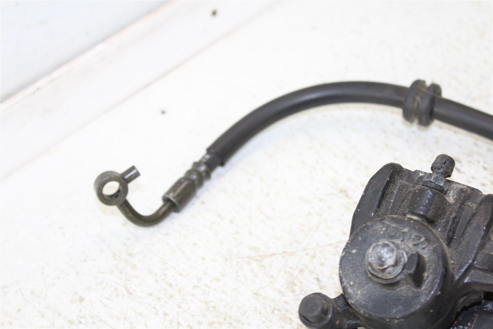 2007 Kawasaki Ninja 650R Rear Brake Caliper w/ Mount Hose Line