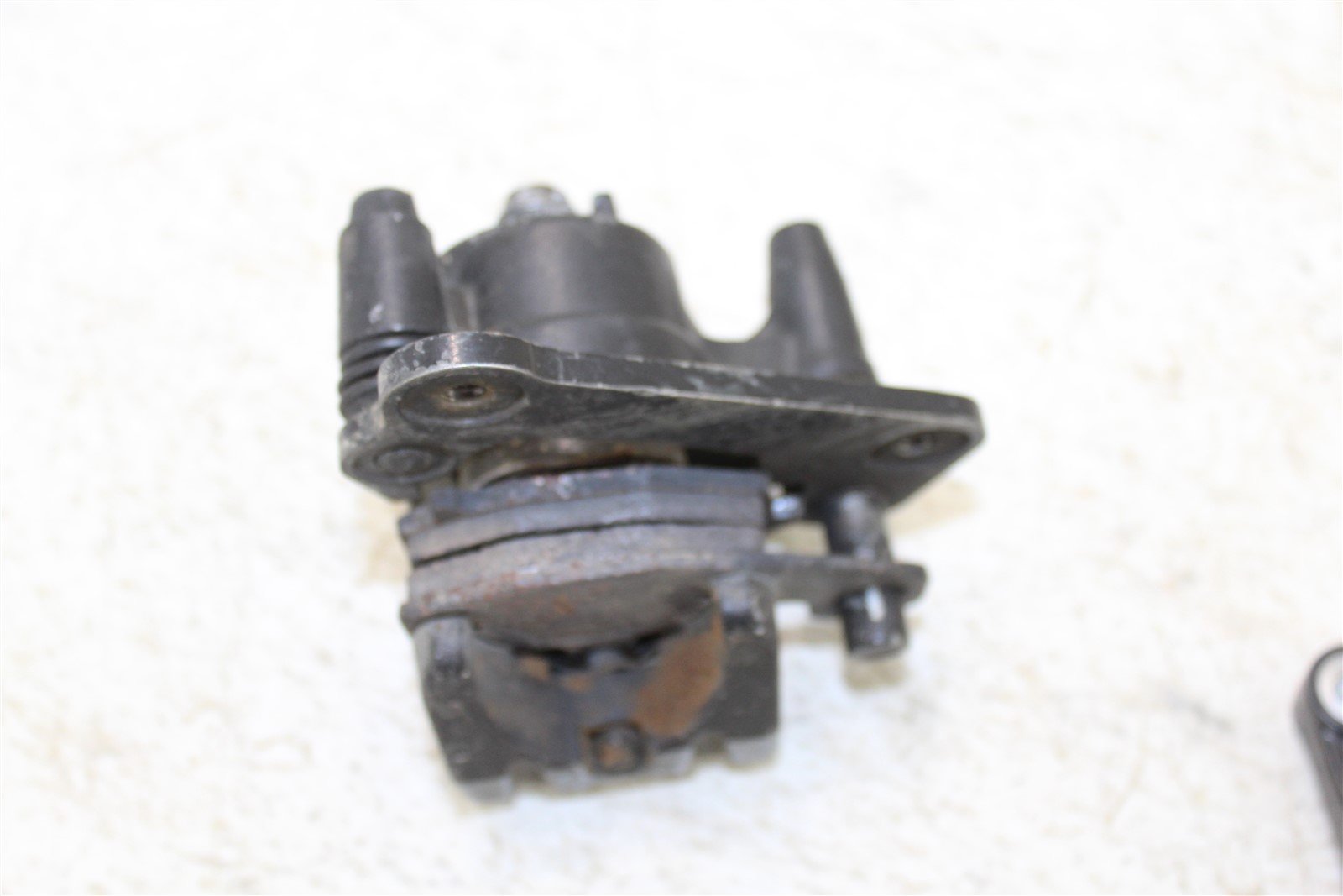 2007 Kawasaki Ninja 650R Rear Brake Caliper w/ Mount Hose Line