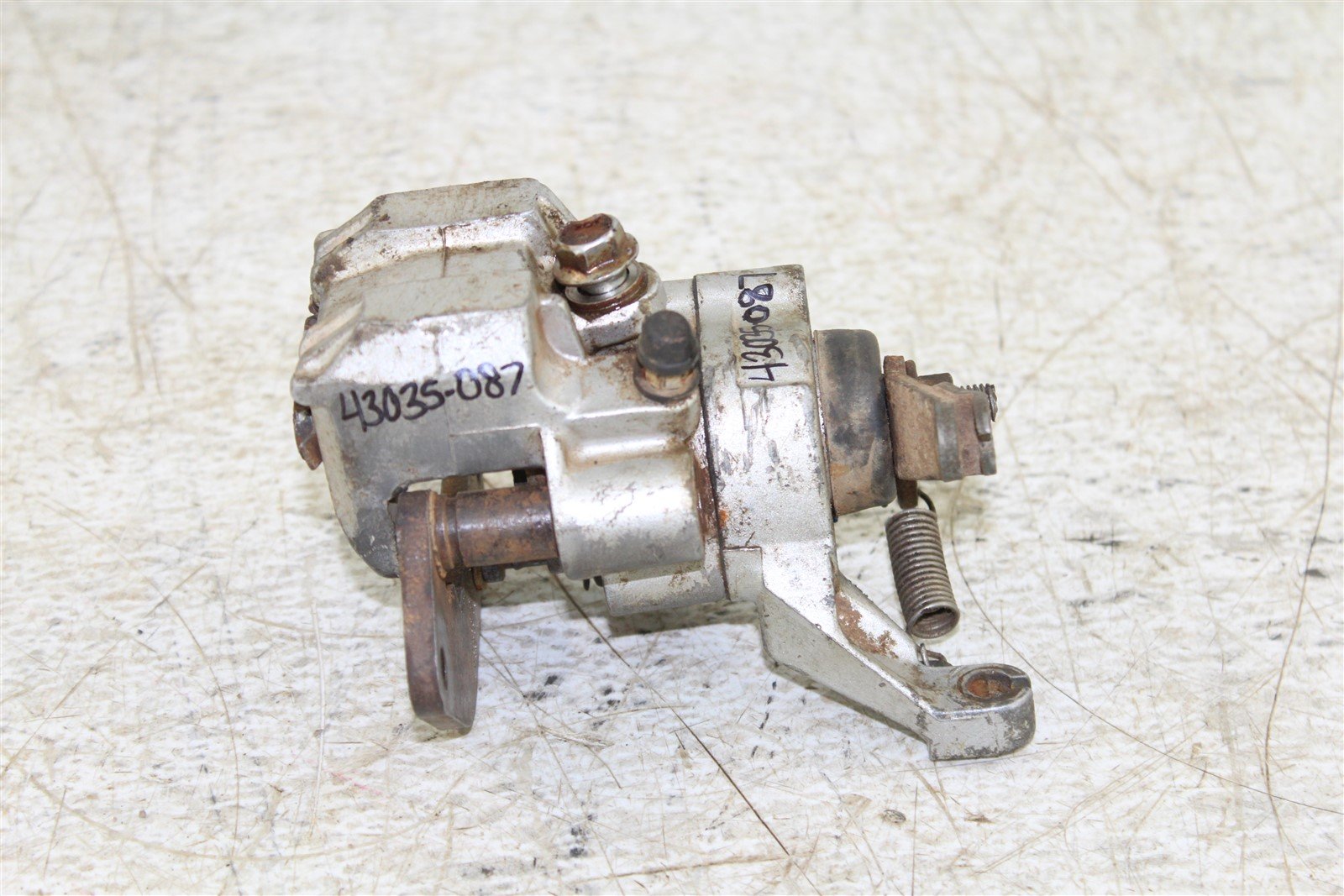 1988 Suzuki Quadsport LT 230S Rear Brake Caliper